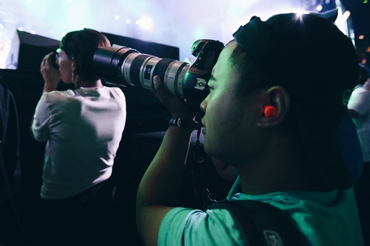 Richard Dizon photographed at a concert with a Canon camera