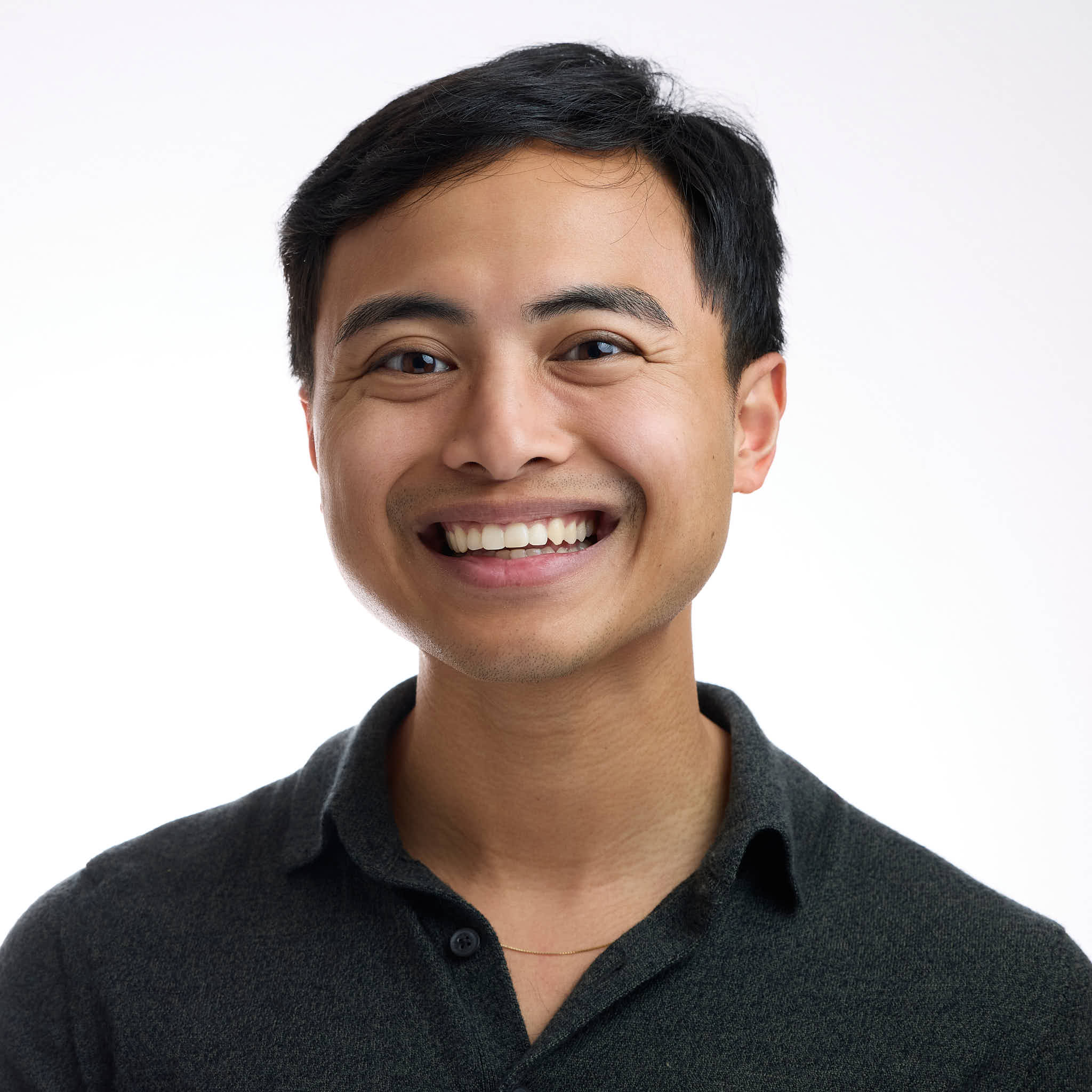 Portrait of Richard Dizon against a light background