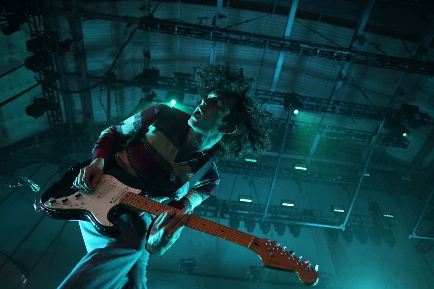 The 1975 lead singer performing on stage at Sprint Pavilion.