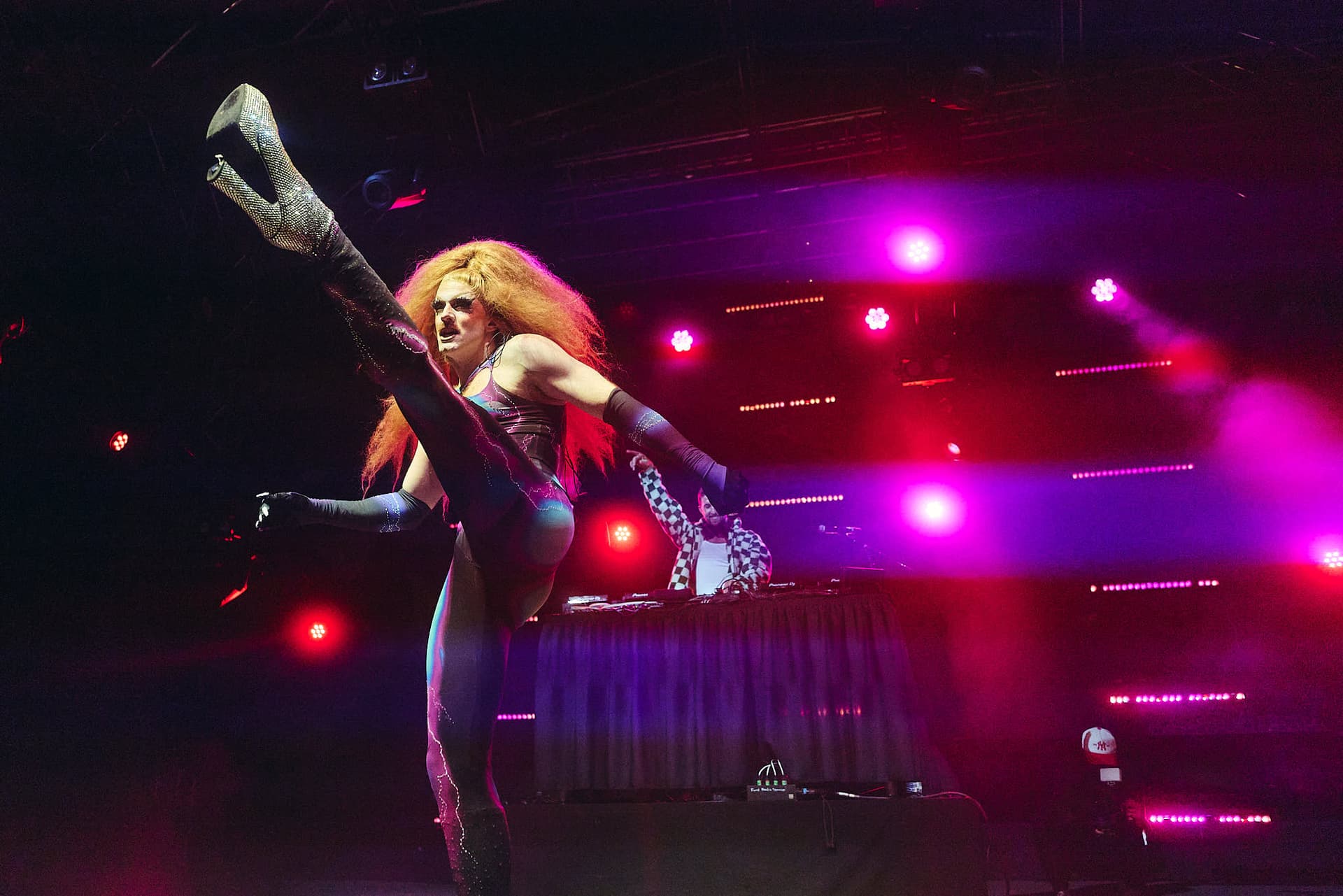 Festival concert photography of electronic dance music artist Pattie Gonia performing at Bumbershoot Arts and Music Festival. Electronic music performance with dynamic stage production expertly documented.