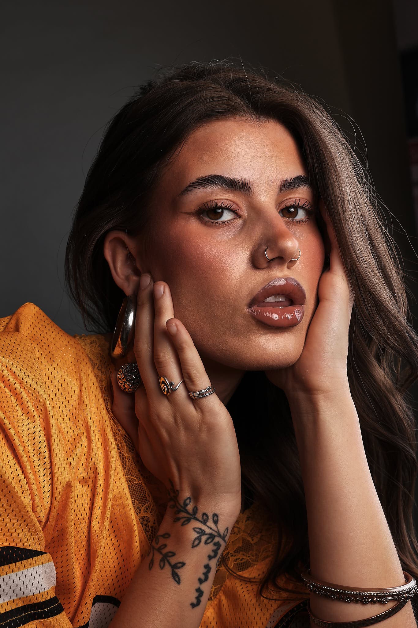 Editorial portrait photography capturing compelling personal narrative and authentic expression. Commercial headshot using professional studio lighting for business publications and brand storytelling.