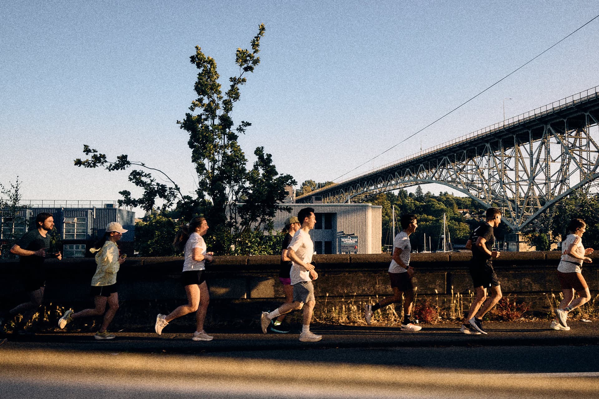 Runners crossing a bridge during Global Running Day.