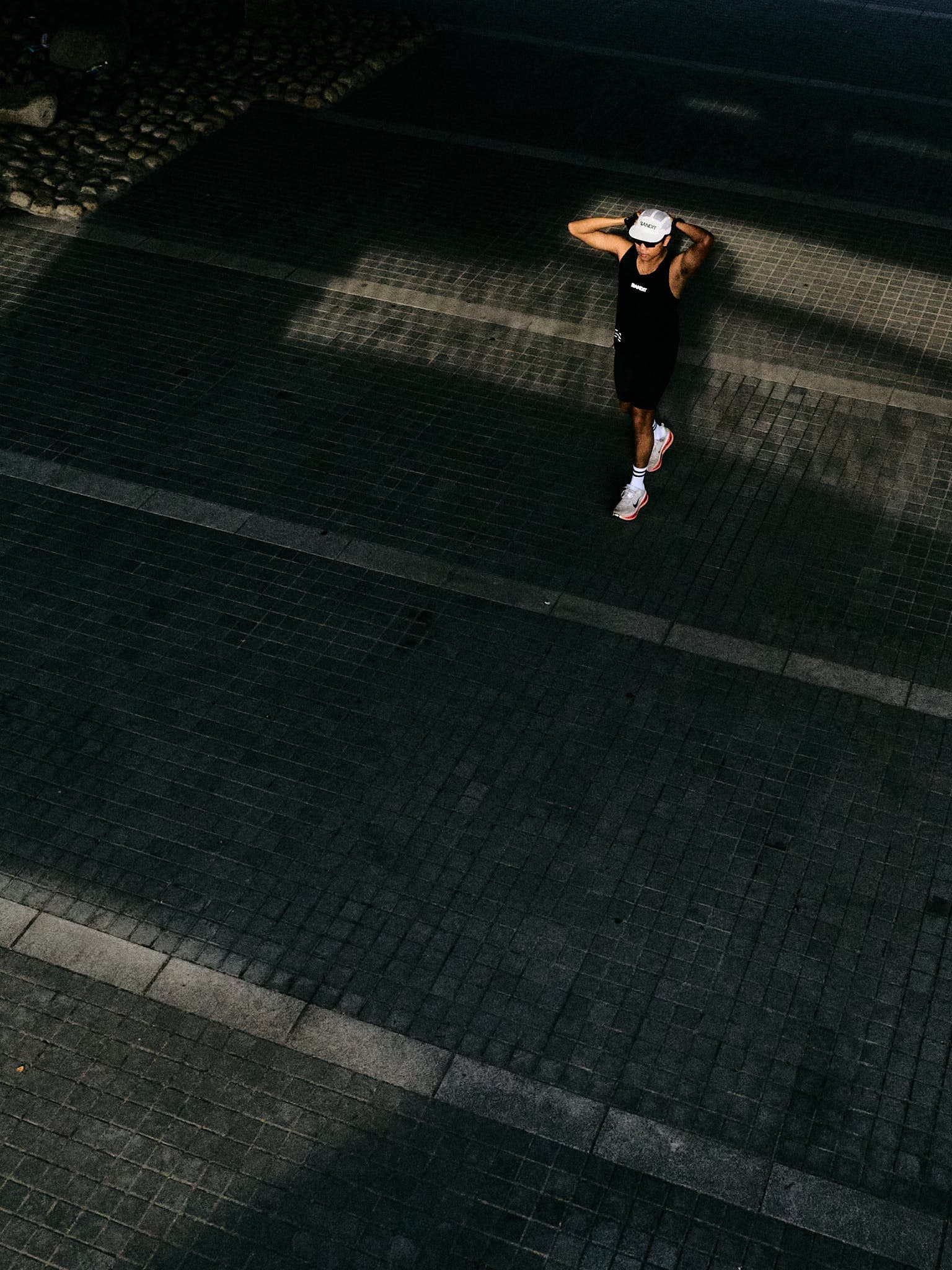 Runner Brian on a bridge in Osaka during an editorial shoot.