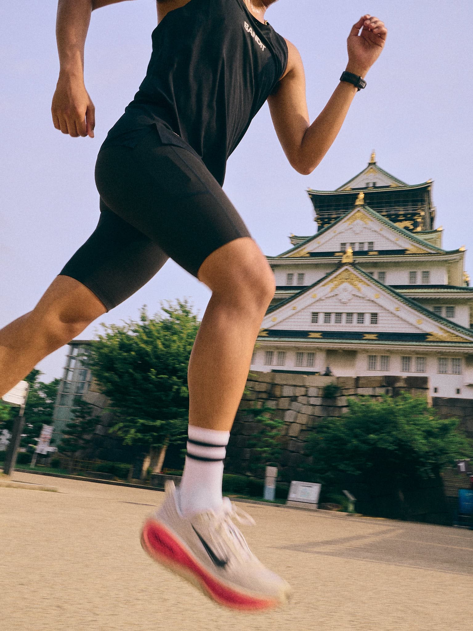 Runner Brian near Osaka Castle during a running editorial session.
