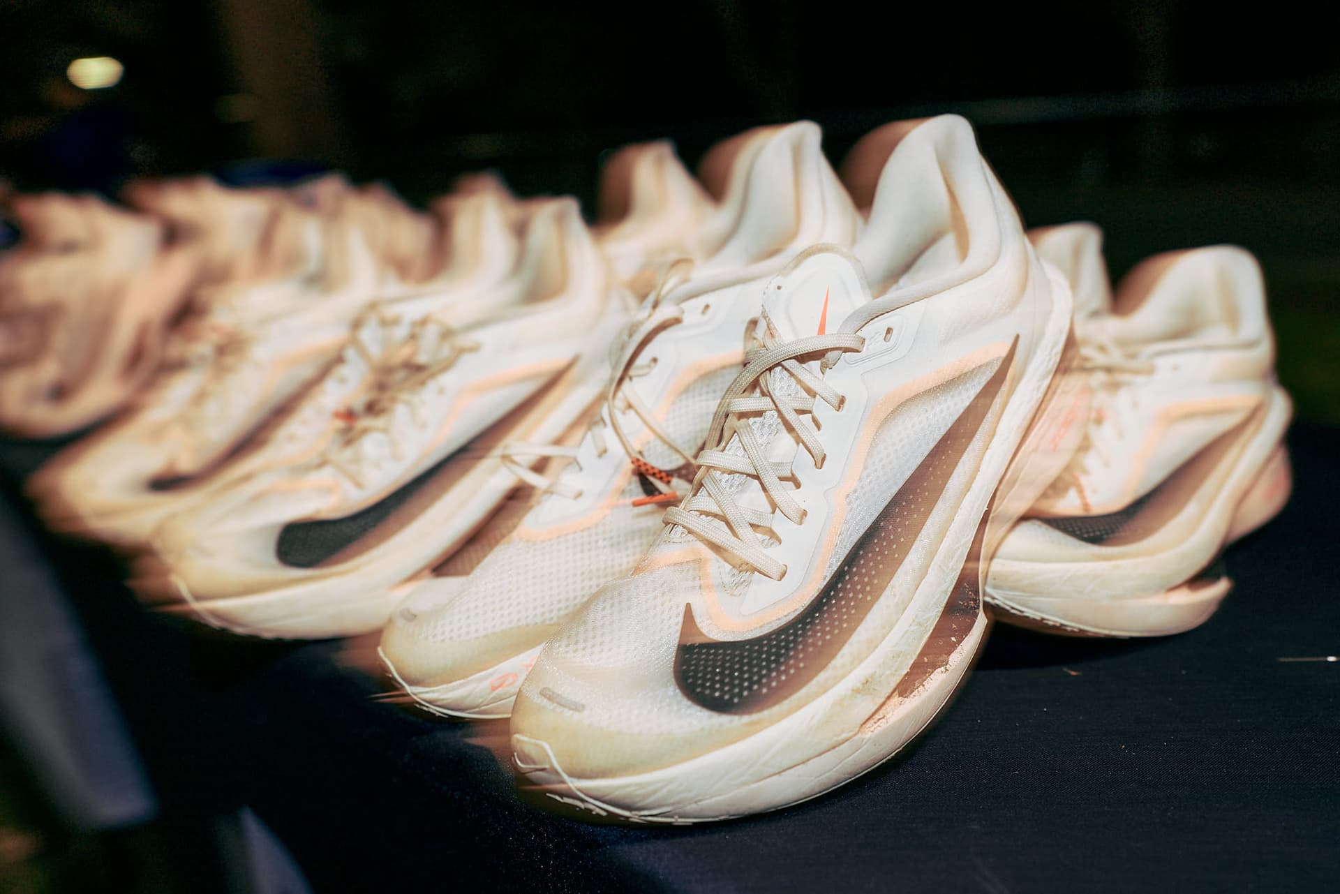 Outdoor product-style image of Nike running shoes.