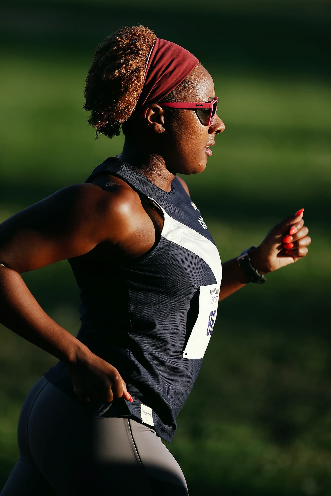 Track running editorial portrait of athlete Vivian.