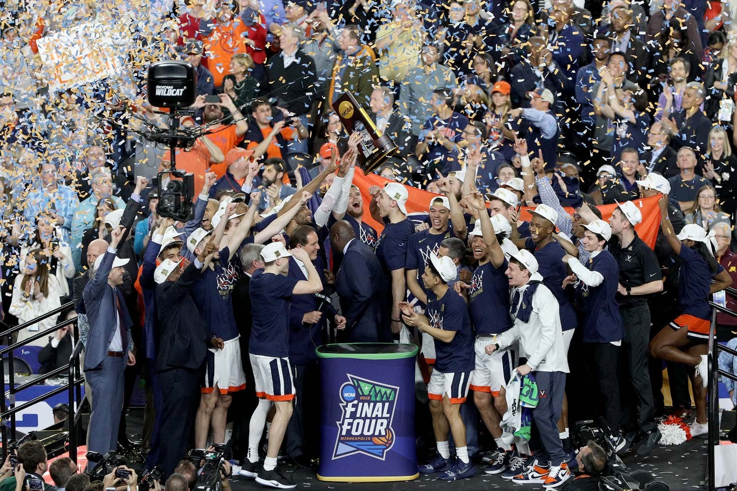 Virginia Cavaliers basketball team celebrating their NCAA national championship victory.